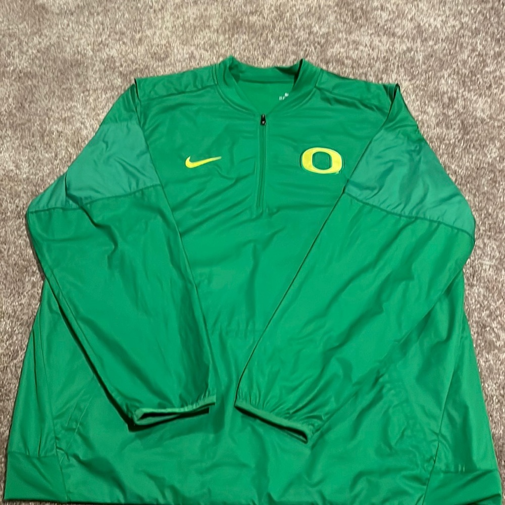 Oregon ducks Nike 1/4 zip coaches jacket.